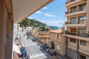 a view of a city street from a building at 2mn Monaco - Coquet appartement rénové - DM in Roquebrune-Cap-Martin