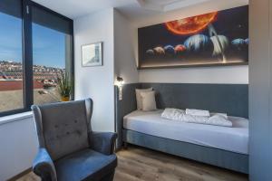 Posteľ alebo postele v izbe v ubytovaní R73 Residences