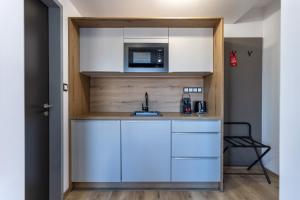 Kuchyňa alebo kuchynka v ubytovaní R73 Residences