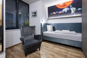 Posteľ alebo postele v izbe v ubytovaní R73 Residences
