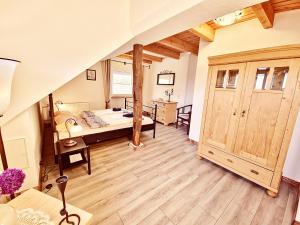 Llit o llits en una habitació de Ostfreesenstuv