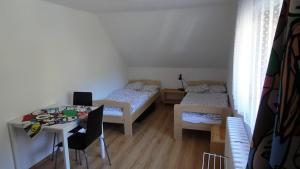 Postel nebo postele na pokoji v ubytování Chata Peklo