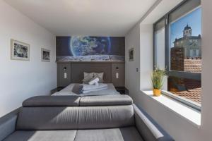 Postel nebo postele na pokoji v ubytování R73 Residences + 37 fotografií