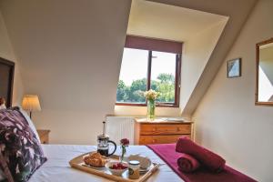 Ένα ή περισσότερα κρεβάτια σε δωμάτιο στο Alpaca Cottage 7mins to Alton Towers