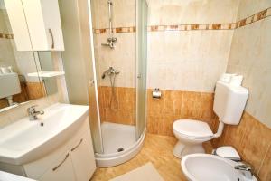 Koupelna v ubytování Apartments Mima