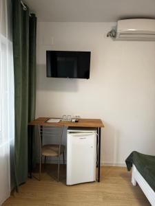 TV a/nebo společenská místnost v ubytování Vila Happy House