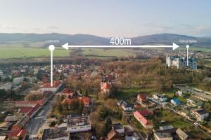 an overhead view of a city with a street at Kaštieľ Lodomeria Manor House in Lučenec
