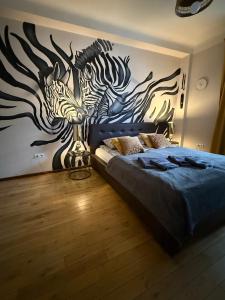 Posteľ alebo postele v izbe v ubytovaní Africa Apartment
