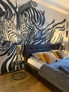 Posteľ alebo postele v izbe v ubytovaní Africa Apartment