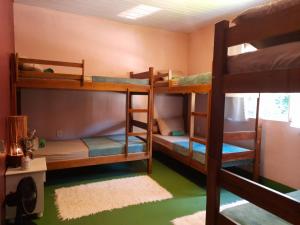 Postel nebo postele na pokoji v ubytování Jungla Hostel