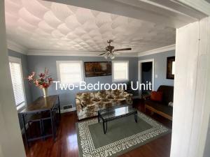 a living room with a couch and a ceiling at Derby City Getaway in Louisville