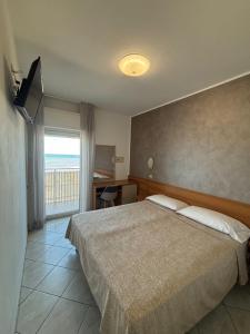 Postel nebo postele na pokoji v ubytování Abahotel