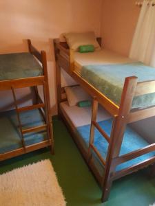 Postel nebo postele na pokoji v ubytování Jungla Hostel