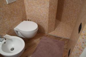 Ένα μπάνιο στο La Conchiglia +3 φωτογραφίες