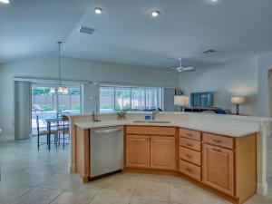 a kitchen with a large island in a room at 2964 Z6 VILLAGE OF FENNEY by REMAX Premier in The Villages