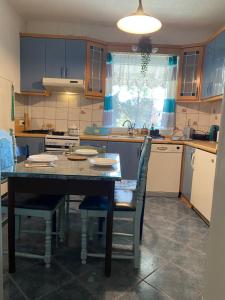 Kuchyň nebo kuchyňský kout v ubytování Apartment Hiža 38