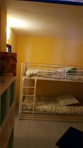 Ένα ή περισσότερα κρεβάτια σε δωμάτιο στο Appartement plein ciel 4-6 pers