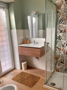 Et badeværelse på Tintarella by Lar Apartments