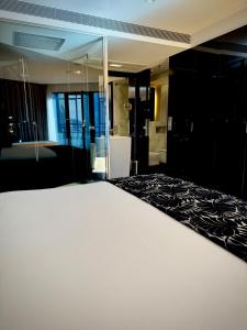 Postel nebo postele na pokoji v ubytování Hotel Inffinit