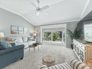 a living room with a couch and a table at 5590 Z6 VILLAGE OF FENNEY by REMAX Premier in The Villages