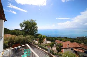 a view of the ocean from the balcony of a house at Oltremare in Maratea