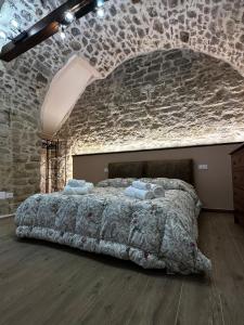 Postel nebo postele na pokoji v ubytování Il Sogno di Loreta