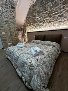 Postel nebo postele na pokoji v ubytování Il Sogno di Loreta