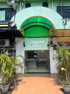 a building with a sign that reads pandan hotel at Pandan Hotel in Papar +26 photos