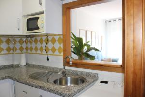 Nhà bếp/bếp nhỏ tại El Ronqueo Apartment +41 ảnh