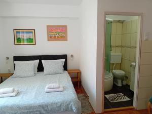 Bilik mandi di Zeravica Rooms B&B