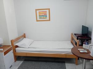 Katil atau katil-katil dalam bilik di Zeravica Rooms B&B