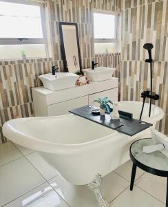Ένα μπάνιο στο Lesotho home stay