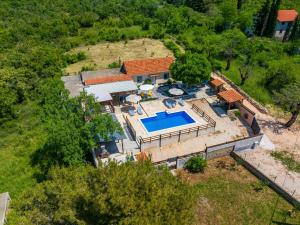 an aerial view of a house with a swimming pool at MY DALMATIA - Holiday home Burgija with private swimming pool in Benkovac