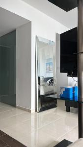 TV a/nebo společenská místnost v ubytování Playa Blanca Town Center