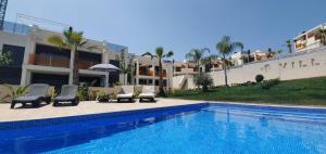 Πισίνα στο ή κοντά στο alegria village resort