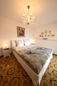 Postel nebo postele na pokoji v ubytování Oasi relax + 42 fotografií