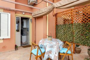A kitchen or kitchenette at Vista Sul Pan di Zucchero - Terrazza vista mare a Nebida