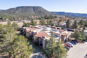 an aerial view of a house with a parking lot at Marcs Red Rock Retreat 2 Primary Suites 2 Bath in Sedona