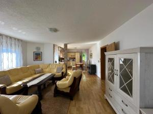 a living room with a couch and a table at Villa Panorama in Bihać