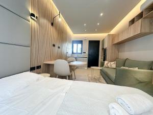 Ένα ή περισσότερα κρεβάτια σε δωμάτιο στο Anna Tiny Apartments