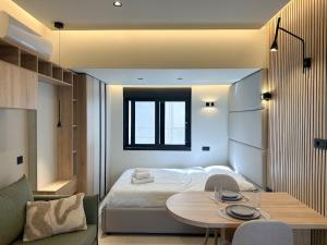 Ένα ή περισσότερα κρεβάτια σε δωμάτιο στο Anna Tiny Apartments