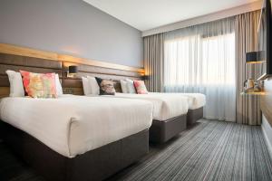 Voodi või voodid majutusasutuse Moxy Dublin City toas