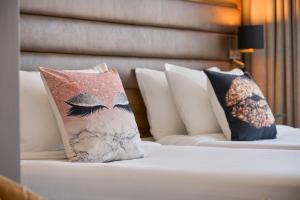 Voodi või voodid majutusasutuse Moxy Dublin City toas