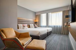 Voodi või voodid majutusasutuse Moxy Dublin City toas