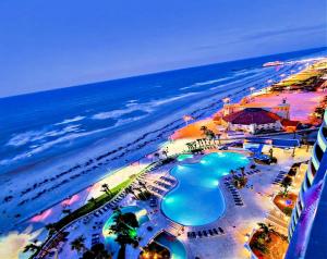 an aerial view of the beach and the ocean at 16th Floor 1 BR Resort Condo Direct Oceanfront Wyndham Ocean Walk Resort Daytona Beach 1605 in Daytona Beach