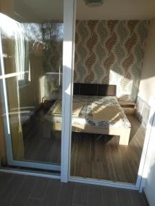 Posteľ alebo postele v izbe v ubytovaní Solar Golden Beach Apartments
