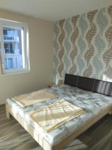 Posteľ alebo postele v izbe v ubytovaní Solar Golden Beach Apartments