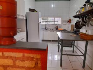 Kuchyň nebo kuchyňský kout v ubytování Jungla Hostel