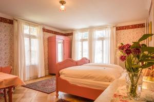 Ένα ή περισσότερα κρεβάτια σε δωμάτιο στο Historic Hotel Falken