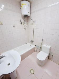 Kúpeľňa v ubytovaní Muscat Dormitory Male&Female